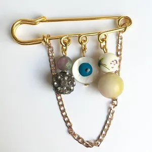 گل سینه زنانه مدل چشم نظر 