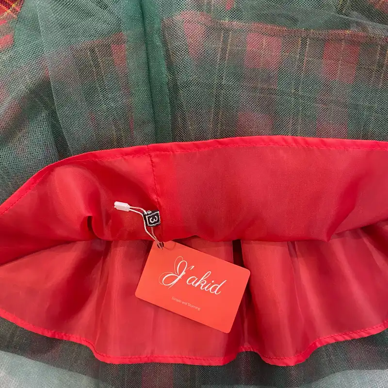 ست پیراهن و گیره مو دخترانه ژاکید مدل کریسمس نارینه