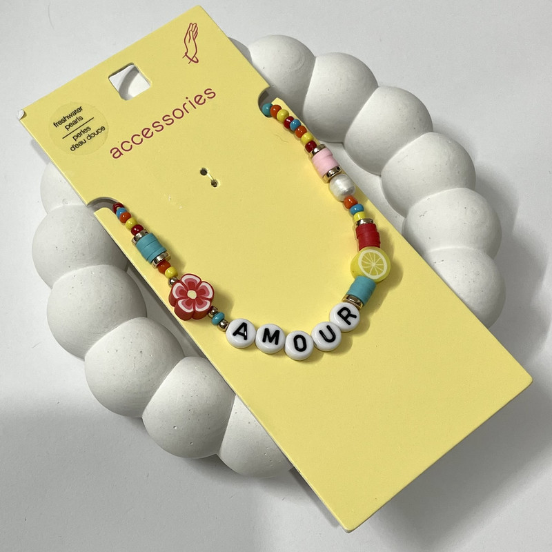 دستبند دخترانه اکسسورایز مدل میوه و گل