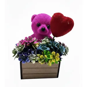 گلدان به همراه گل مصنوعی مدل خرس سبد دار