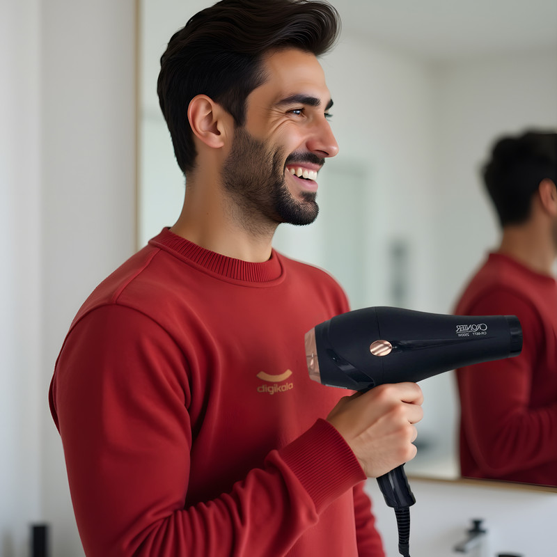 سشوار نیمه حرفه‌ای کرونر مدل CR-6677 2500W، موتور AC، توان مصرفی 2500 وات، دارای قابلیت باد سرد، فناوری تولید یون، وزن 540 گرم، به همراه 2 عدد سری متمرکزکننده