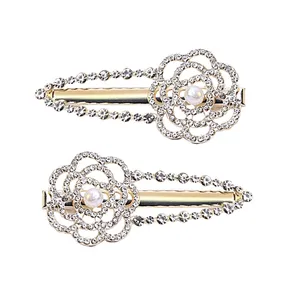 گیره مو زنانه مدل انبری غنچه گل بسته 2 عددی