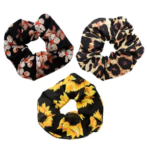 کش مو زنانه دلنار گالری مدل اسکرانچی شکوفه و آفتابگردان و پلنگی مجموعه 3 عددی