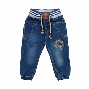 شلوار جین دم پا کش بچگانه مدل اسکیت‌بورد