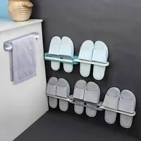 نگهدارنده دمپایی و کفش دیواری مدل H109، نصب دیواری با چسب 2طرفه بسیار قوی، 3تایی متصل، جنس پلاستیک، ابعاد 25&times;8&times;4 سانتی&zwnj;متر، وزن 200 گرم