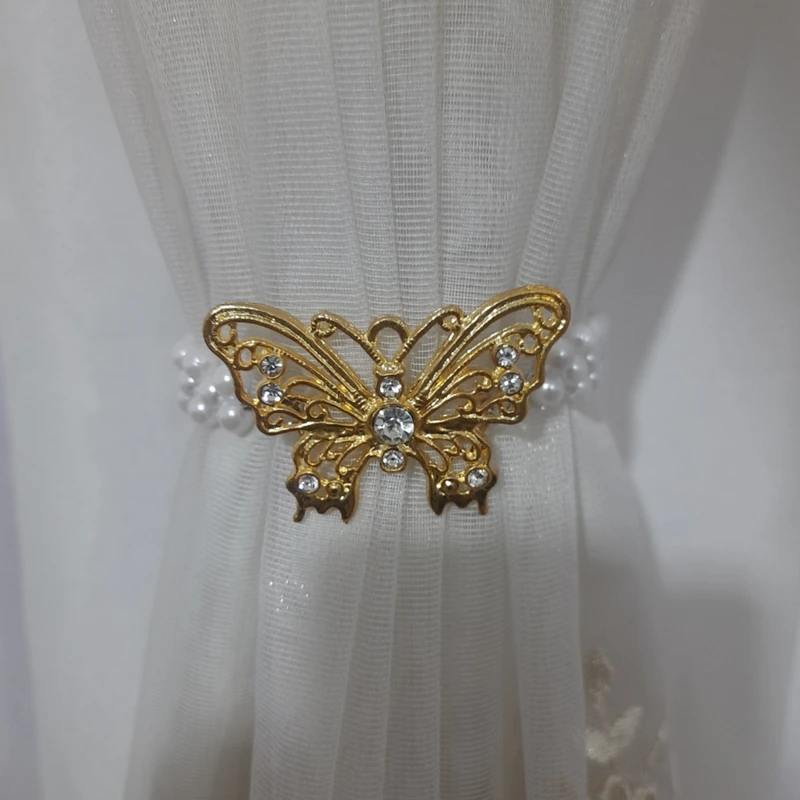 عکس شماره 2 : پرده جمع کن مدل پروانه