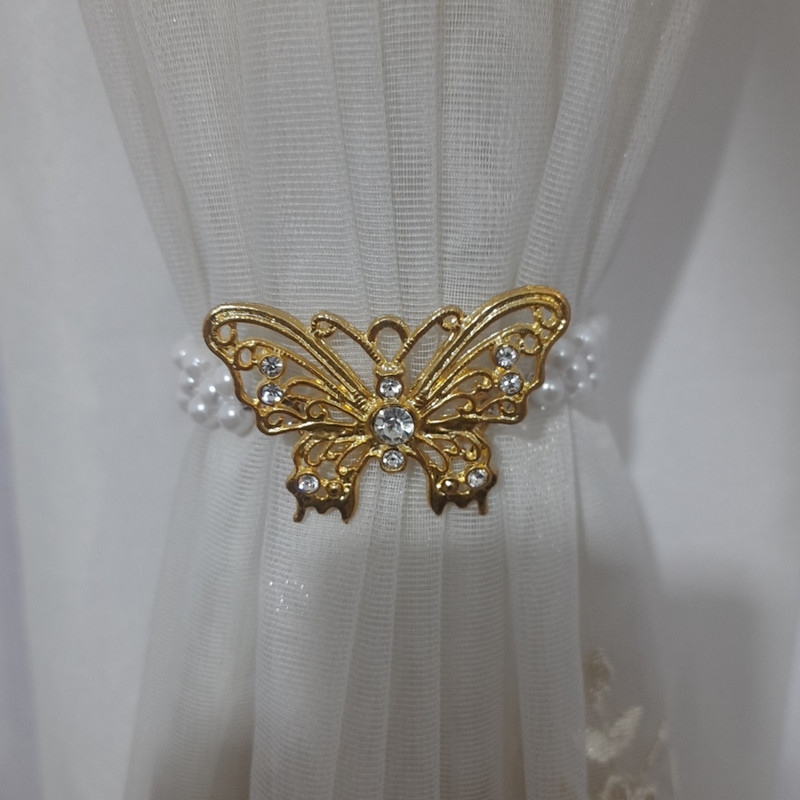 پرده جمع کن مدل پروانه