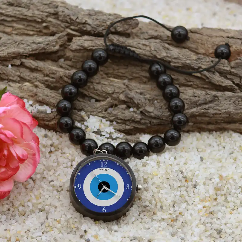 ساعت مچی عقربه ای ناکسیگو مدل چشم نظر کد BF11904