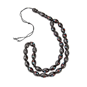 تسبیح بازرگانی میلادی مدل کشکول میناکاری کهربا کد T_345