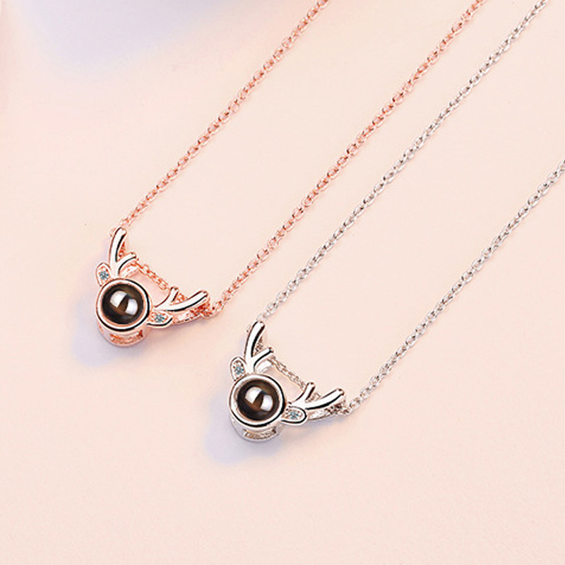 گردنبند زنانه مدل دوستت دارم به صد زبان دنیا طرح گوزن گردنبند زنانه مدل دوستت دارم به صد زبان دنیا طرح گوزن