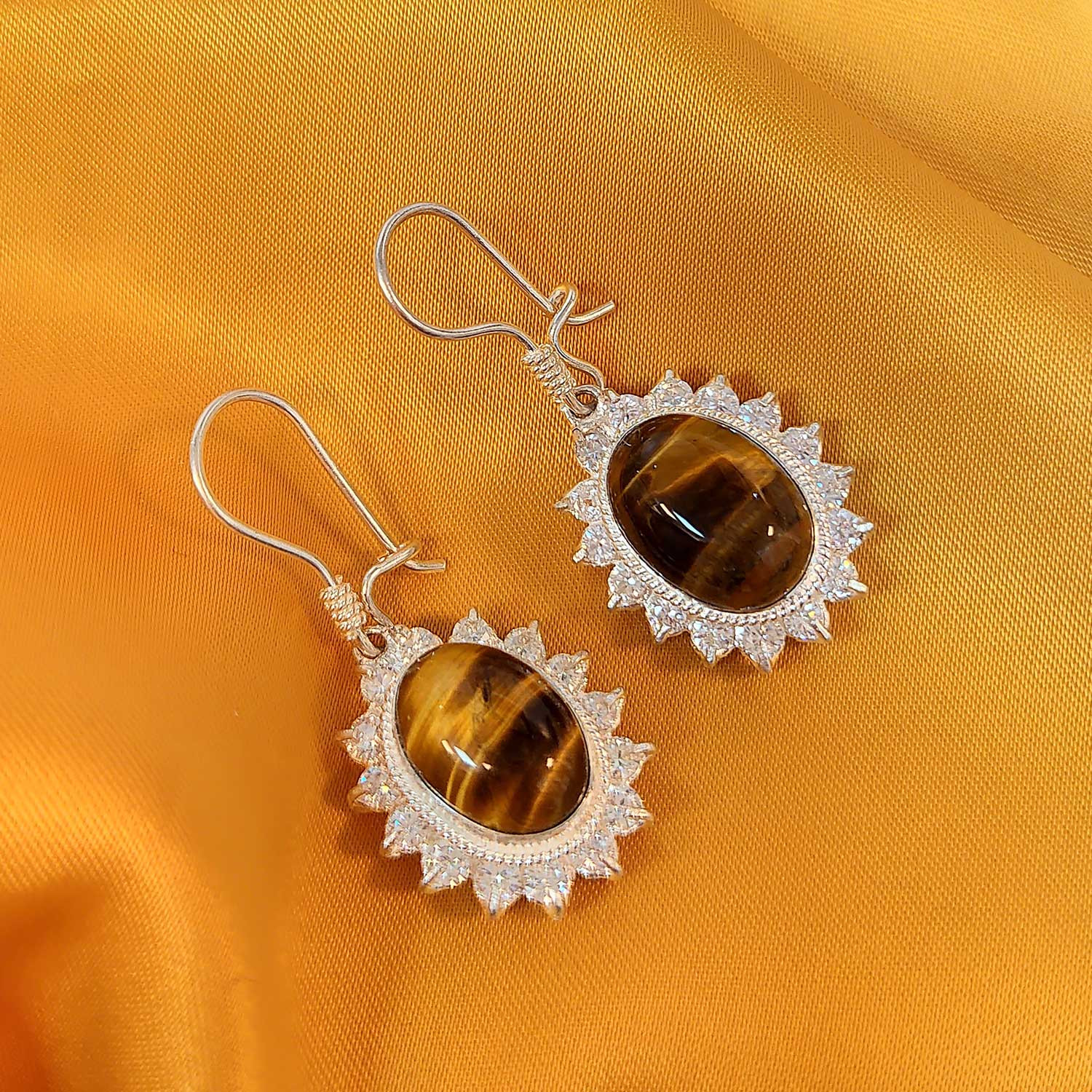 گوشواره نقره زنانه مدل چشم ببر کد TG10047 گوشواره نقره زنانه مدل چشم ببر کد TG10047