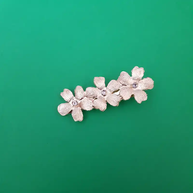 گیره مو زنانه مدل گل