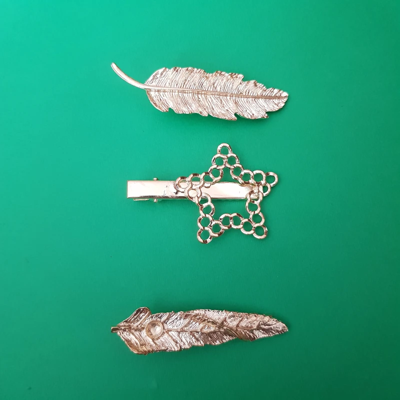 گیره مو زنانه مدل برگ و ستاره زنجیری بسته سه عددی