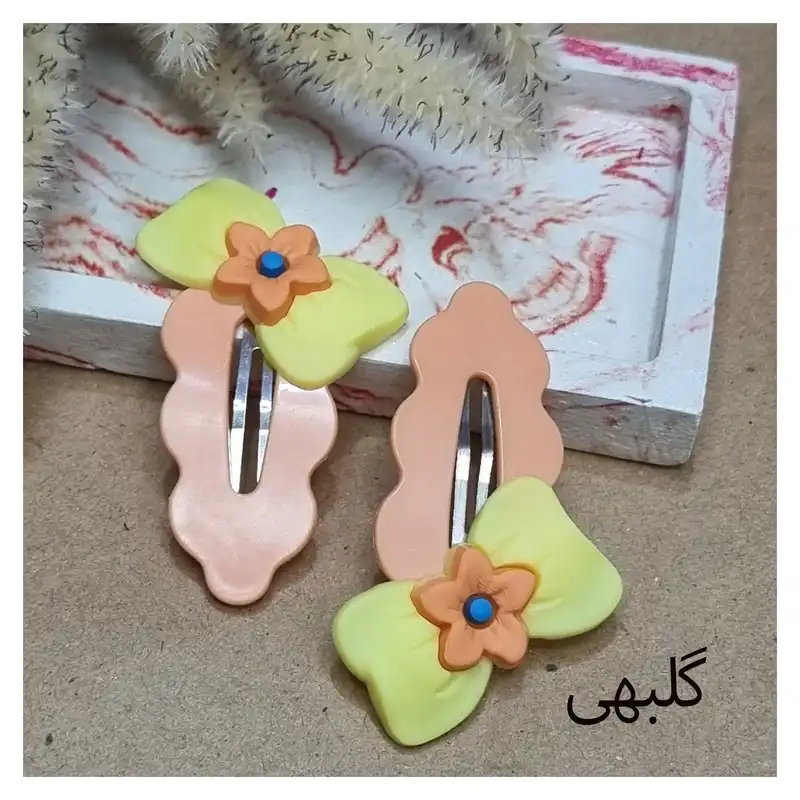 گیره مو زنانه مدل تق تقی پیکسل دار کد03 بسته 2 عددی