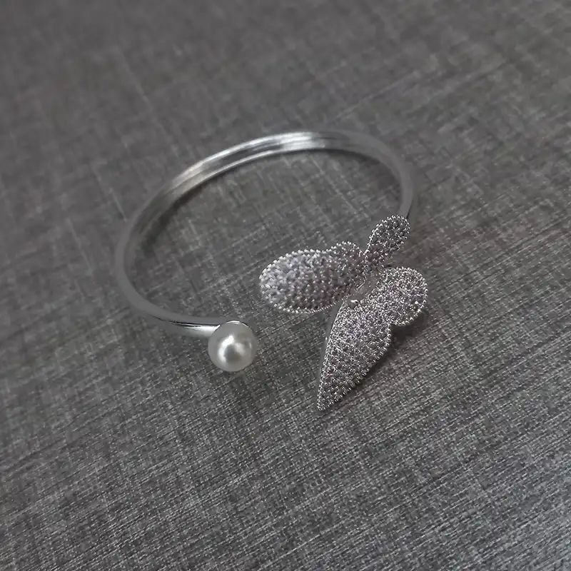 دستبند زنانه وای اس ایکس مدل پروانه و مروارید