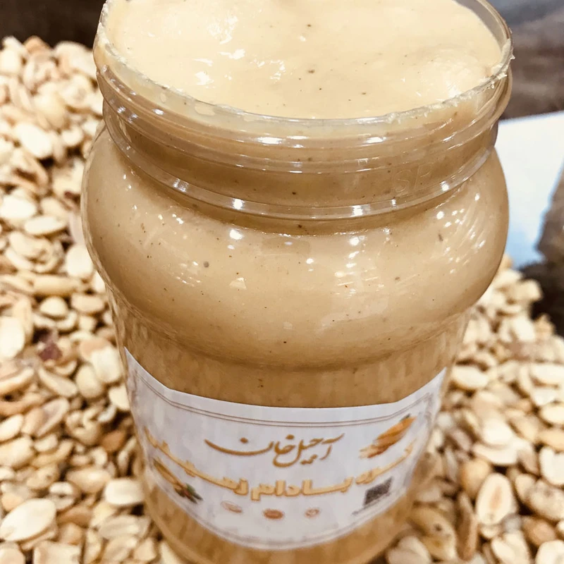 عکس شماره 2 : کره بادام زمینی بدون نمک و شکر آجیل خان-1000 گرم