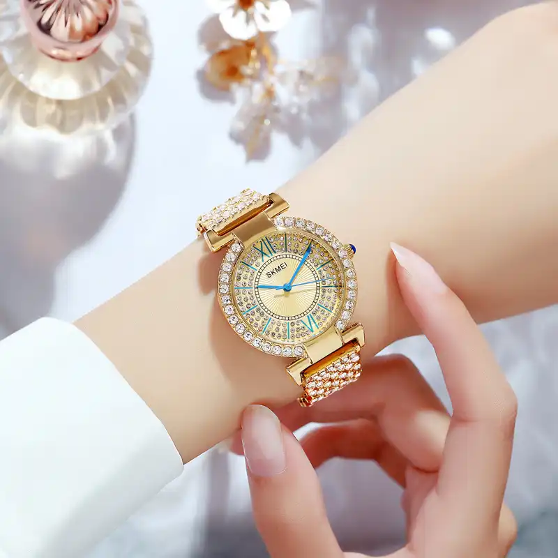 ساعت مچی عقربه ای زنانه اسکمی مدل 1956GLD