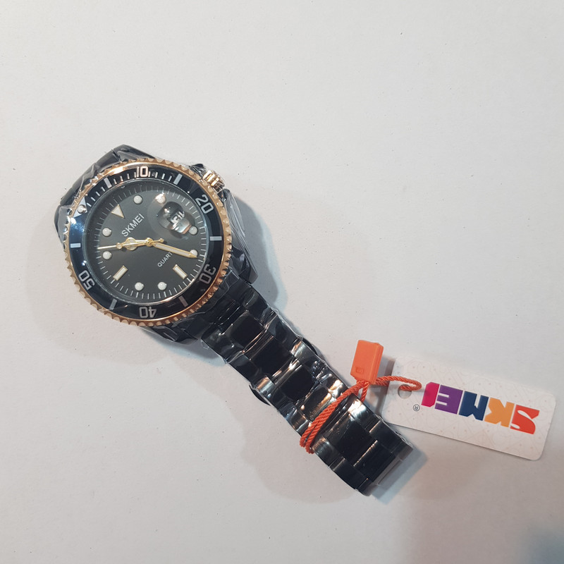 ساعت مچی عقربه‌ای مردانه اسکمی مدل 79-17 کد 02