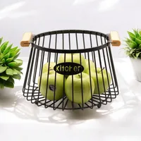سبد میوه&zwnj;خوری فلزی مدل Kitchen با طراحی مدرن، دسته چوبی، قابلیت حمل آسان، مناسب نگهداری میوه و سبزیجات، شست&zwnj;وشو با دست و تک&zwnj;طبقه
