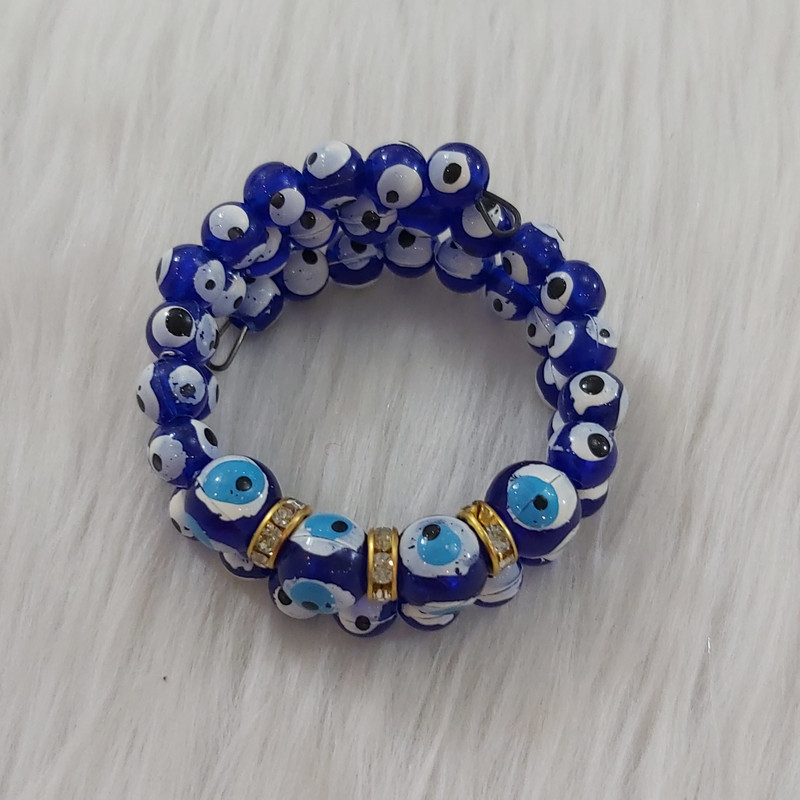 دستبند دخترانه مدل فنری مروارید چشم زخم کد chzkh111