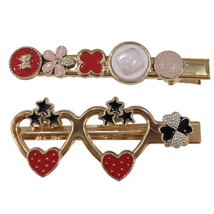 گیره مو زنانه مدل مجلسی فلزی طرح عینک و نگینی بسته 2 عددی