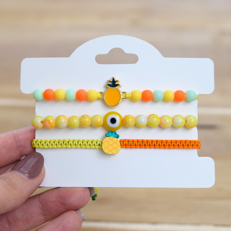 دستبند دخترانه دلنار گالری مدل آناناس و چشم نظر مجموعه 3 عددی