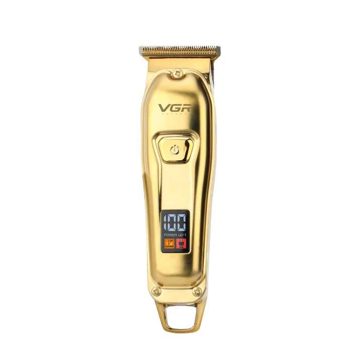 ماشین اصلاح موی سر و صورت وی جی ار مدل V-965، اصلاح به صورت حجم زن، منبع انرژی باتری، تکنولوژی اصلاح به صورت برش مستقیم، مدت زمان شارژ 150 دقیقه و مدت زمان استفاده پس از شارژ 120 دقیقه، به همراه شارژر، روغن، برس تمیزکننده، قابلیت اصلاح با شماره صفر