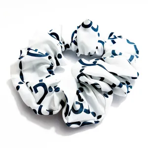 کش مو زنانه مدل اسکرانچی طرح GG