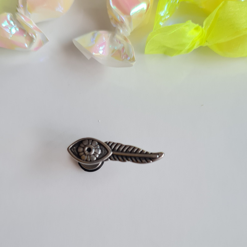 پیرسینگ گوش مدل چشم و برگ