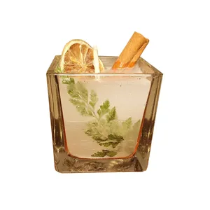 شمع دست ساز مدل مکعبی دارچین و لیمو