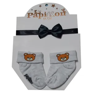 ست هدبند و جوراب نوزادی کد 78