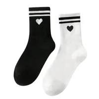 جوراب ساق بلند زنانه مدل قلب خط دار بسته 2 عددی