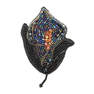 گل سینه زنانه مدل گل شیپوری