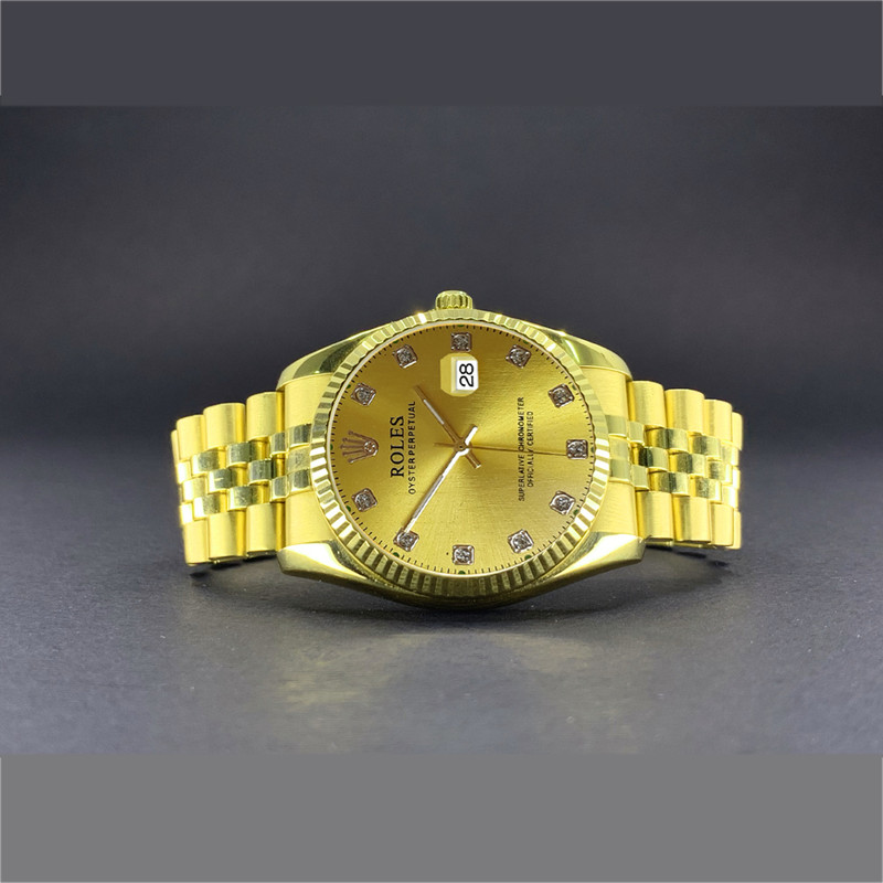 ساعت مچی عقربه‌ای مردانه مدل رولس کد FUIIGOLD-NGIN