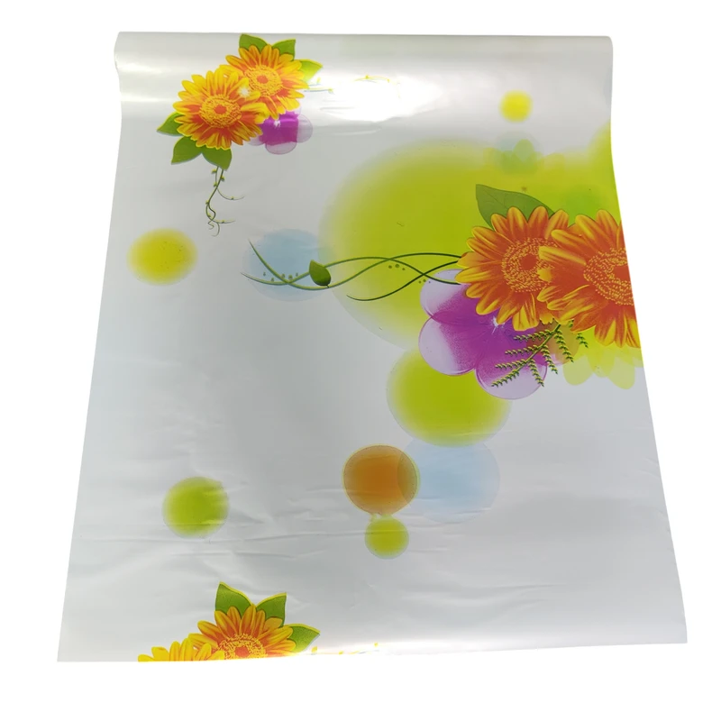 سفره یکبار مصرف نایلون سپید مدل لوکس گل آفتاب گردان رول 12 متر