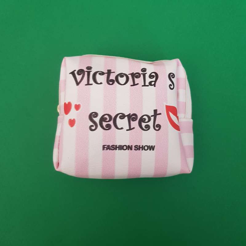 کیف لوازم آرایش زنانه مدل راه راه