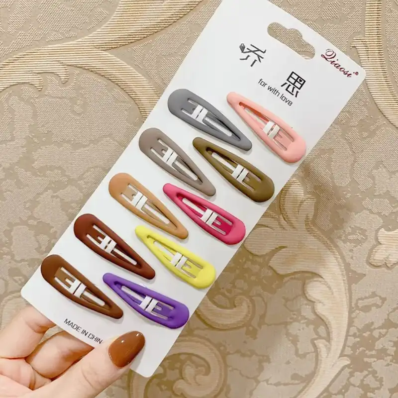 گیره مو زنانه مدل تق تقی کد T بسته 10 عددی