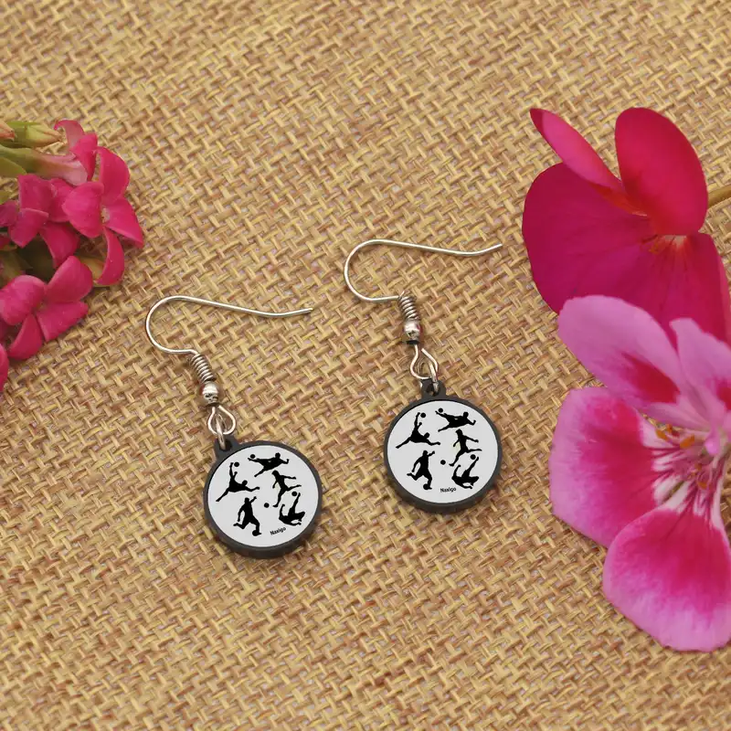 گوشواره زنانه ناکسیگو مدل شب تاب طرح فوتبال ساحلی کد ES8409