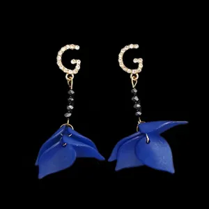 گوشواره زنانه مدل گل نگین دار