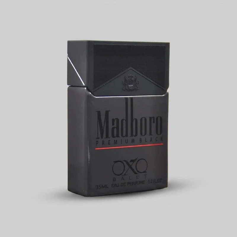 عطر جیبی اکس بالت مدل madboro premium black با رایحه گرم حجم 35 میلی‌لیتر