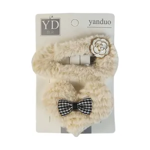 گیره مو زنانه مدل فانتزی پشمالو قلبی کد 4032 مجموعه 2 عددی