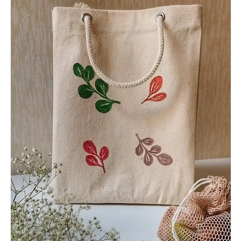 ساک دستی مدل برگ های رنگی