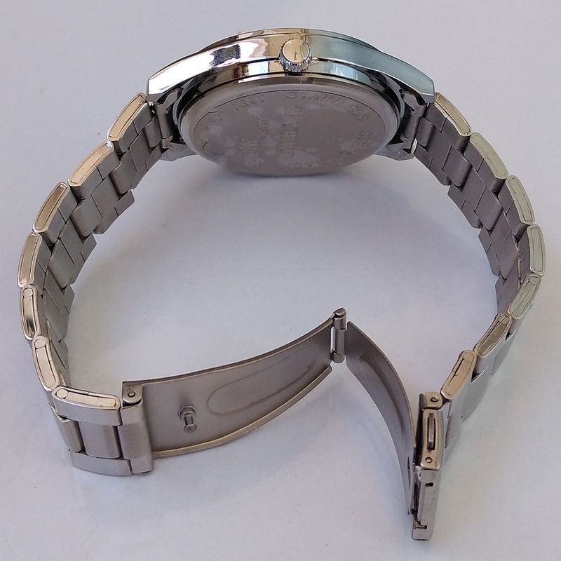 ساعت مچی عقربه ای پسرانه مدل بندفلزی کد 14X44