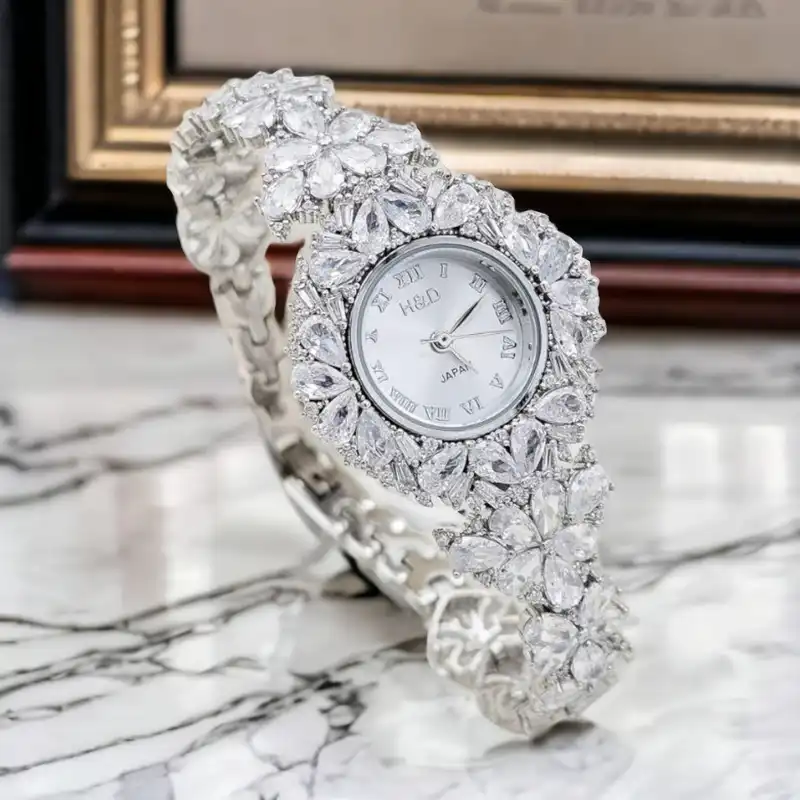 ساعت مچی عقربه ای نقره زنانه مدل گل مارکیز خور 0152