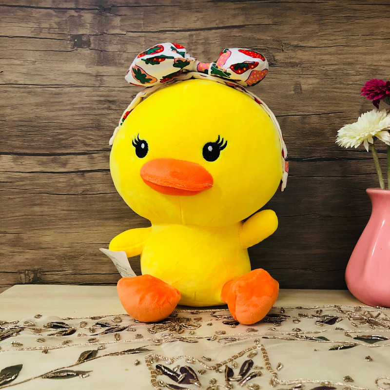 عروسک طرح جوجه اردک مدل تل دار ارتفاع 35 سانتی متر