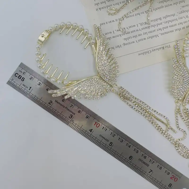 گیره مو زنانه مدل آبشاری گوجه ای طرح بال فرشته آویز دار