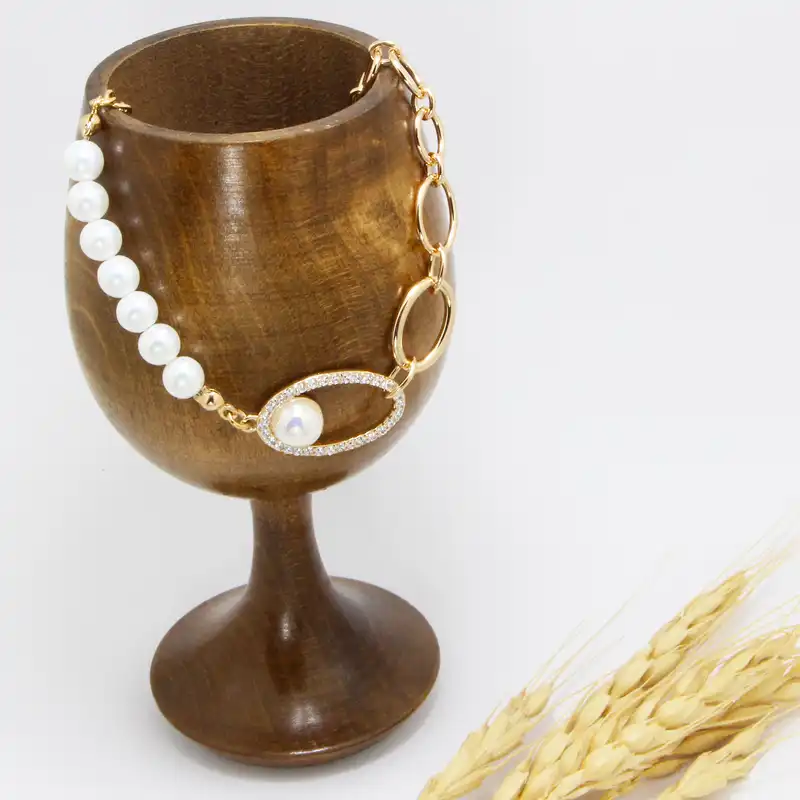 دستبند زنانه ژوپینگ مدل مروارید کد 140