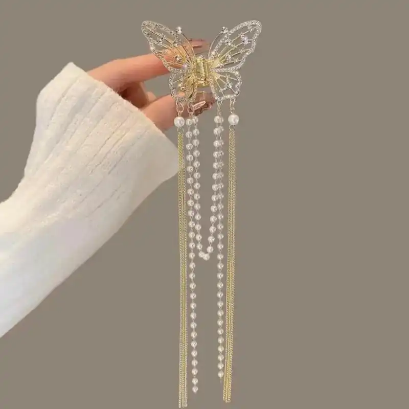 کلیپس مو زنانه مدل فلزی طرح پروانه نگینی آویز دار