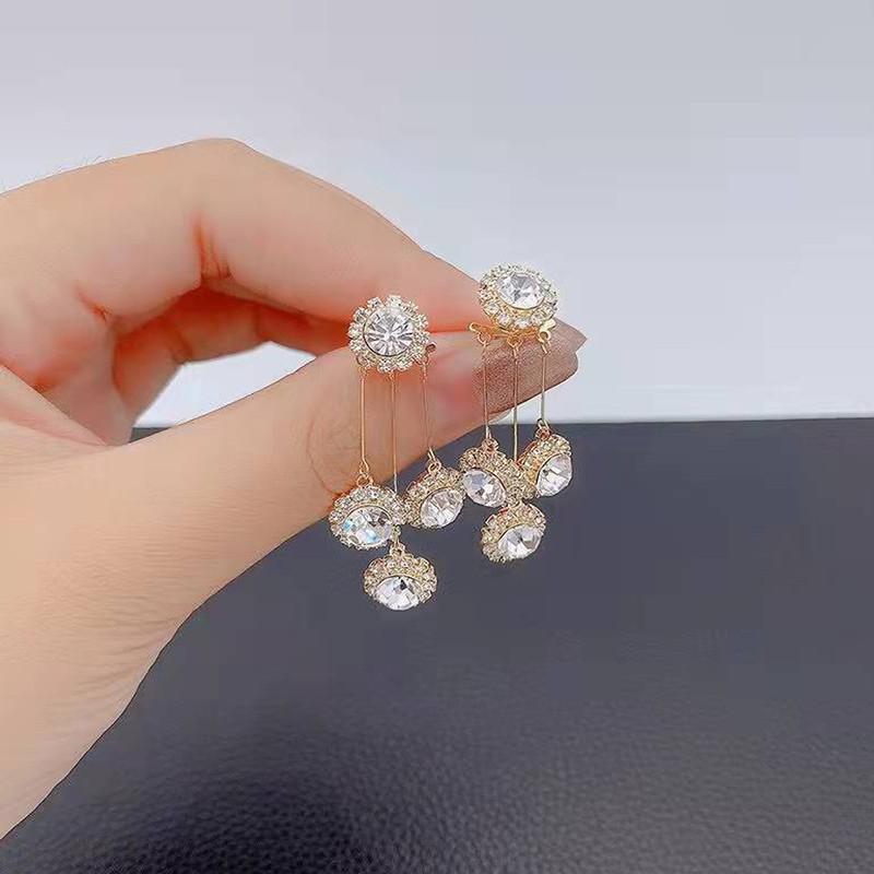 گوشواره زنانه مدل آویز دایره ای کد 00710 گوشواره زنانه مدل آویز دایره ای کد 00710