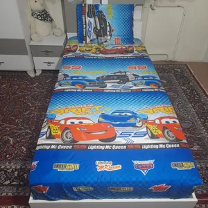 سرویس ملحفه مدل کشدوز niki03.20 طرح ماشین کد 90 یک نفره دو تکه